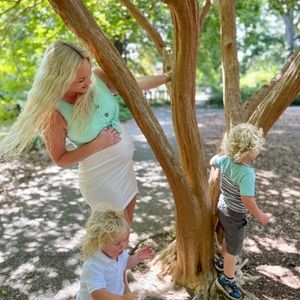 Green and white maternity dress